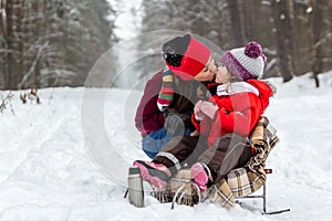 Mother and daughter having fun at winter time