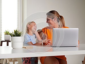 mother and daughter at home