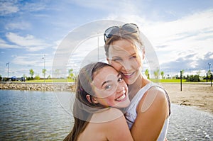 Mother and daughter at the lake