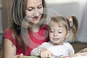 Mother And Daughter Learning At Home
