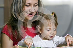 Mother And Daughter Learning At Home