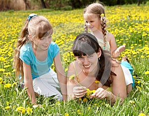 Mother with daughter in outdoor.