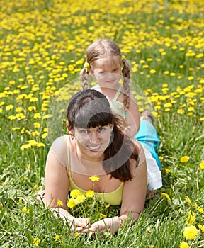 Mother with daughter in outdoor.