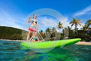 Mother and daughter paddling