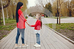 Mother and daughter in a park