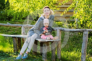 Mother and daughter in the park in spring time