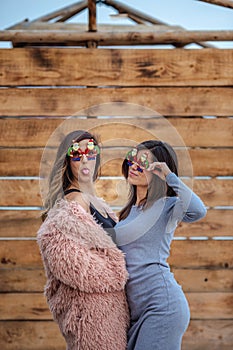 Mother and daughter party on the beach