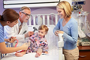 Mother And Daughter In Pediatric Ward Of Hospital