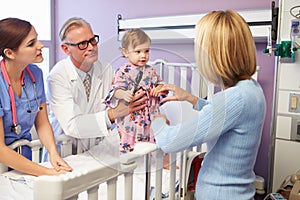 Mother And Daughter In Pediatric Ward Of Hospital