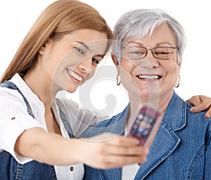 Mother and daughter photographing themselves
