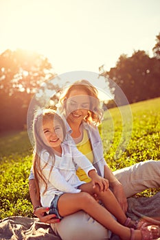 Mother and daughter on picnic