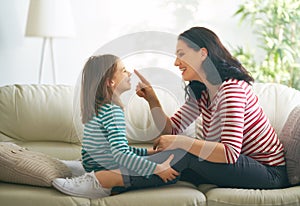 Mother and daughter playing