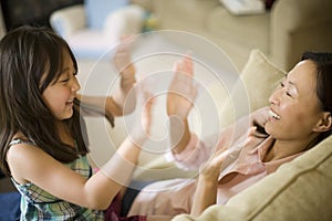 Mother and daughter playing
