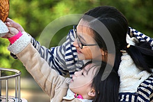 MOTHER AND DAUGHTER PLAYING