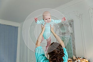 Mother and daughter playing at home