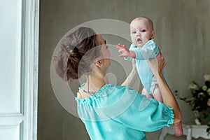 Mother and daughter playing at home