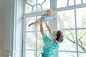 Mother and daughter playing at home