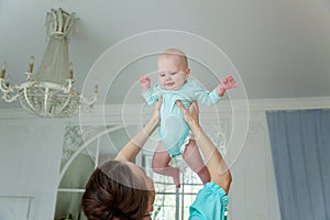 Mother and daughter playing at home