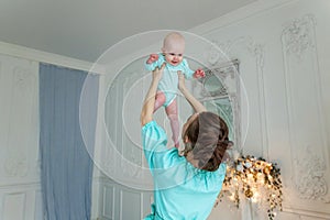 Mother and daughter playing at home