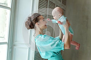 Mother and daughter playing at home