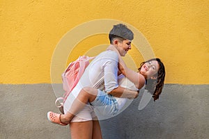 Mother and daughter playing together while going to the beach.