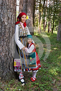 Mother and daughter posing in Bulgarian dress