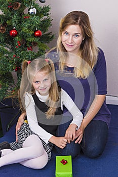 Mother and daughter with presents