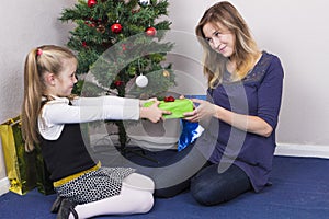 Mother and daughter with presents