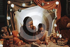 Mother and Daughter Reading a Book