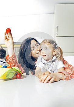 Mother and daughter and red easter egg