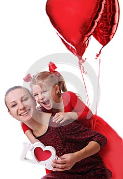 Mother and daughter with red word love and balloons