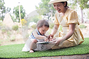 Mother and daughter relax and read a book