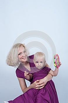 Mother and daughter same dress in Studio on white background