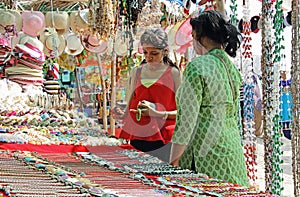 Mother and Daughter Shopping in Flea Market