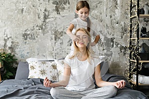 Mother and daughter spending time at home