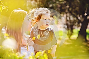 Mother and daughter in spring