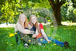 Mother and daughter in summer nature