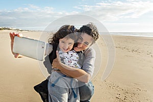 Mother and daughter taking a picture of themselves