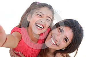 Mother and daughter taking self portrait
