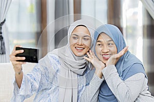 Mother and daughter taking a selfie