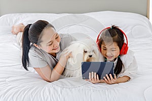 Mother and daughter with their dogs.