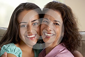 Mother And Daughter Together At Home