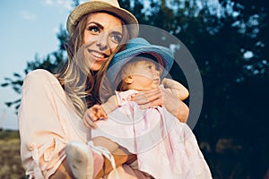 Mother and daughter together outdoors