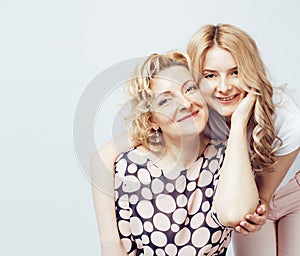 Mother with daughter together posing happy smiling isolated on white background with copyspace, lifestyle people concept