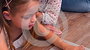 Mother and daughter using laptop