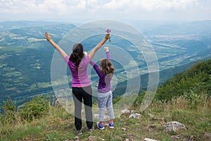 Mother and daughter at the viewpoint