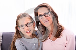 Mother And Daughter Wearing Eyeglasses