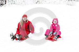 Mother and daughter in winter