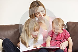 Mother And Daughters Reading Book