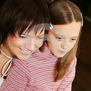 Mother & daugther looking at computer